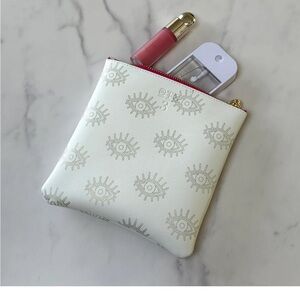 OTG247 #3 Eye Patterned with with gold and pink Pouch